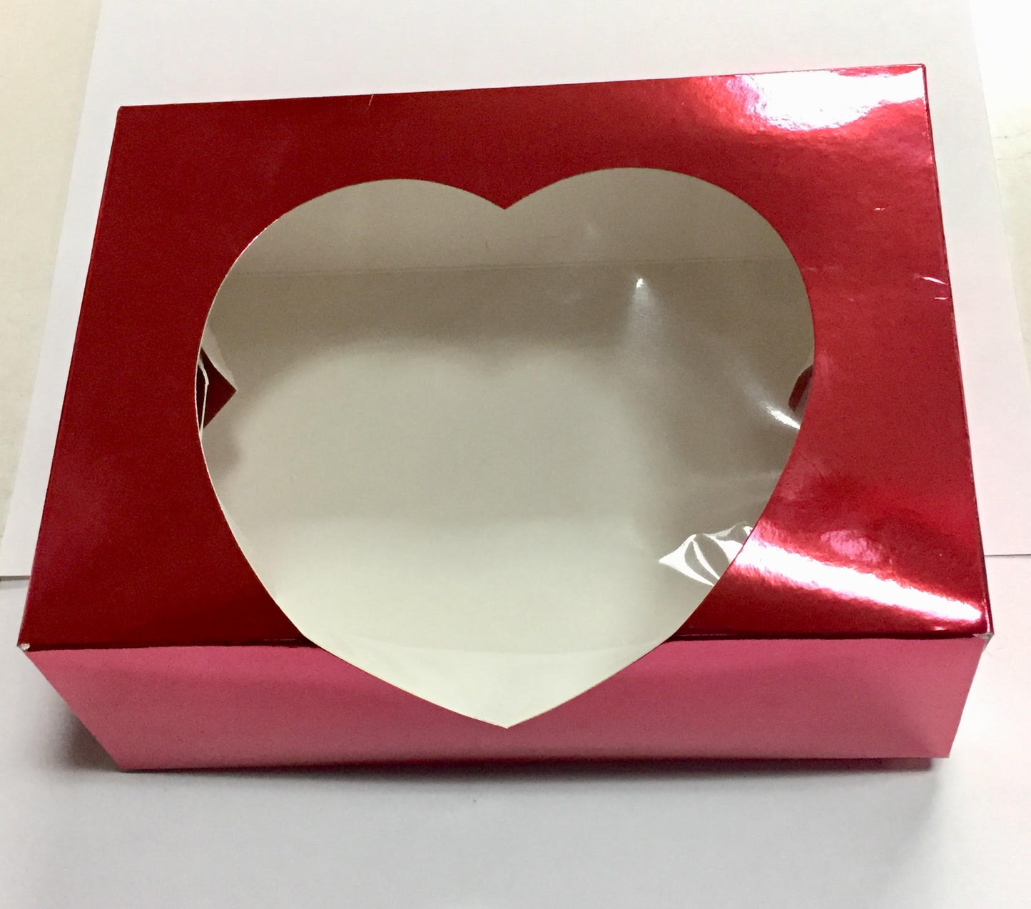Red Foil Cookie Box with a Heart Cut Out