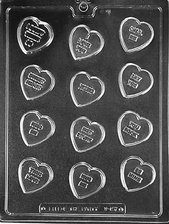 Image of chocolate mold with 12 hearts imprinted with common valentine's day sayings such as I Love You, Kiss Me, Say Yes and more. 