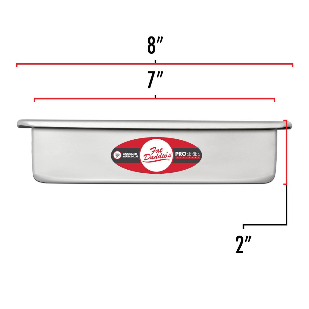 image shows the dimensions of a 7 inch square cake pan. The outer dimension is 8 inches. The inner dimension is 7 inches. the depth is 2 inches