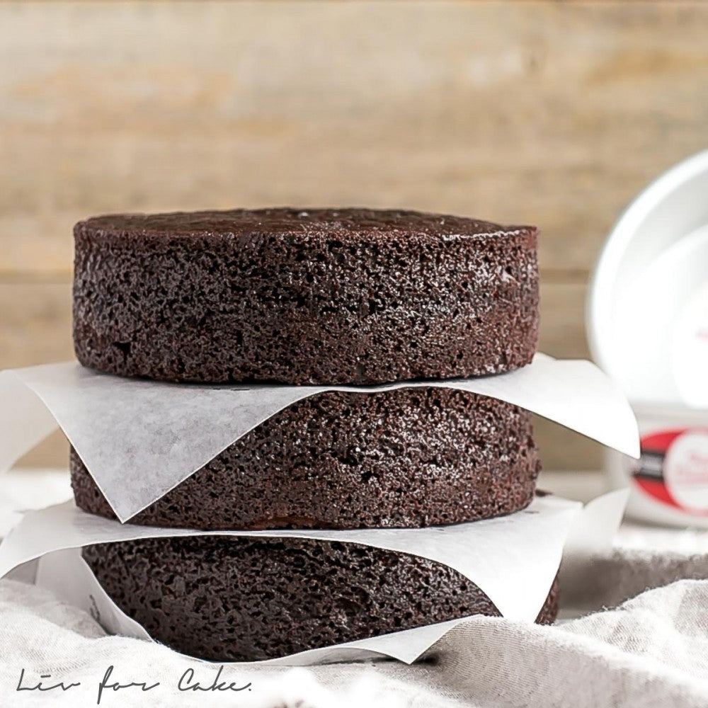 image of 3 layers of chocolate cake baked in a round pan