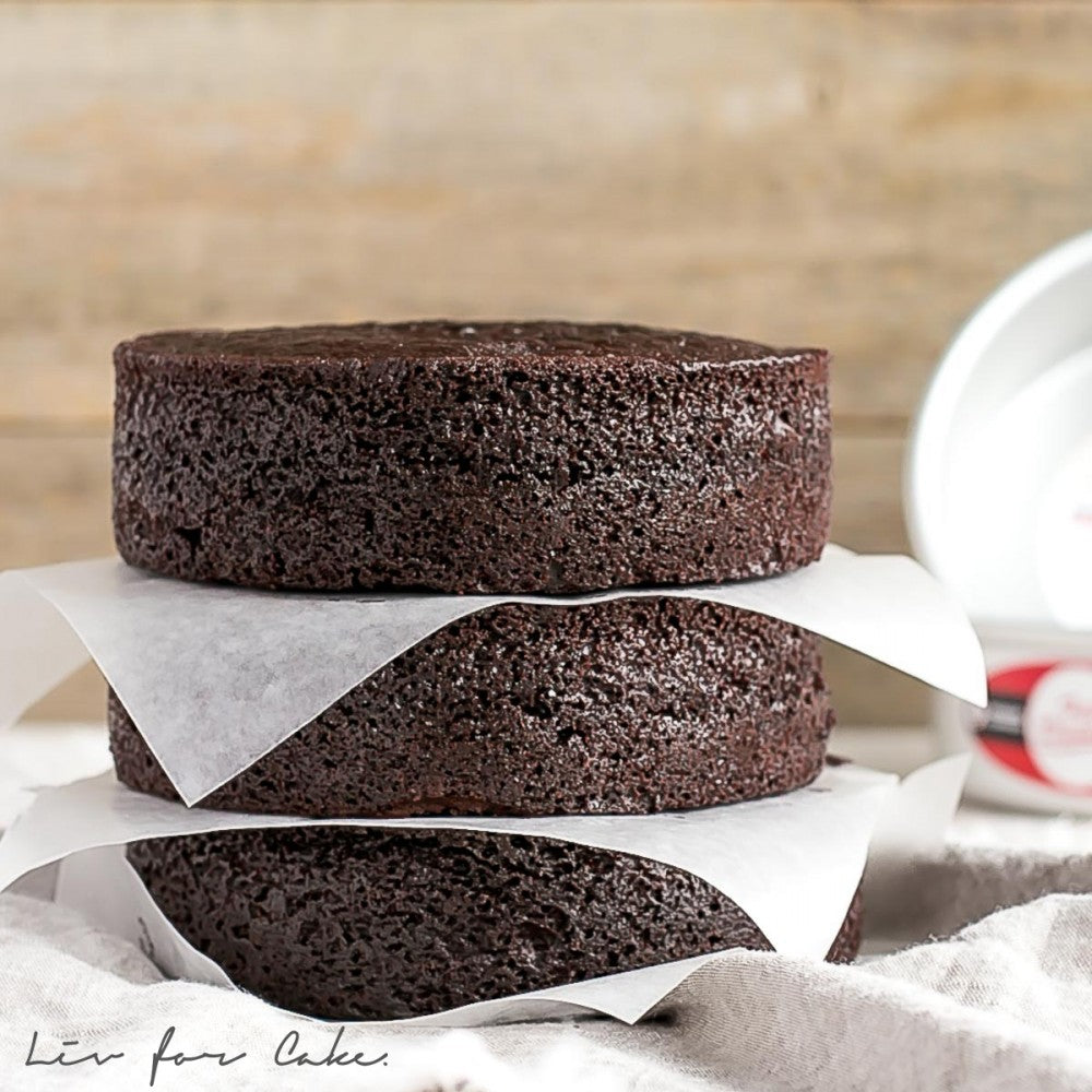 image of 3 layers of chocolate cake baked in a round 3 inch depth cake pan