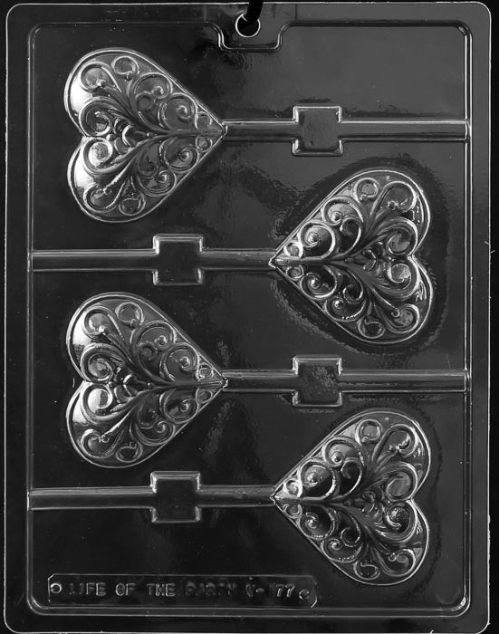 picture of chocolate mold for heart shaped lollipops. Mold includes 4 heart shaped cavities with a swirl pattern