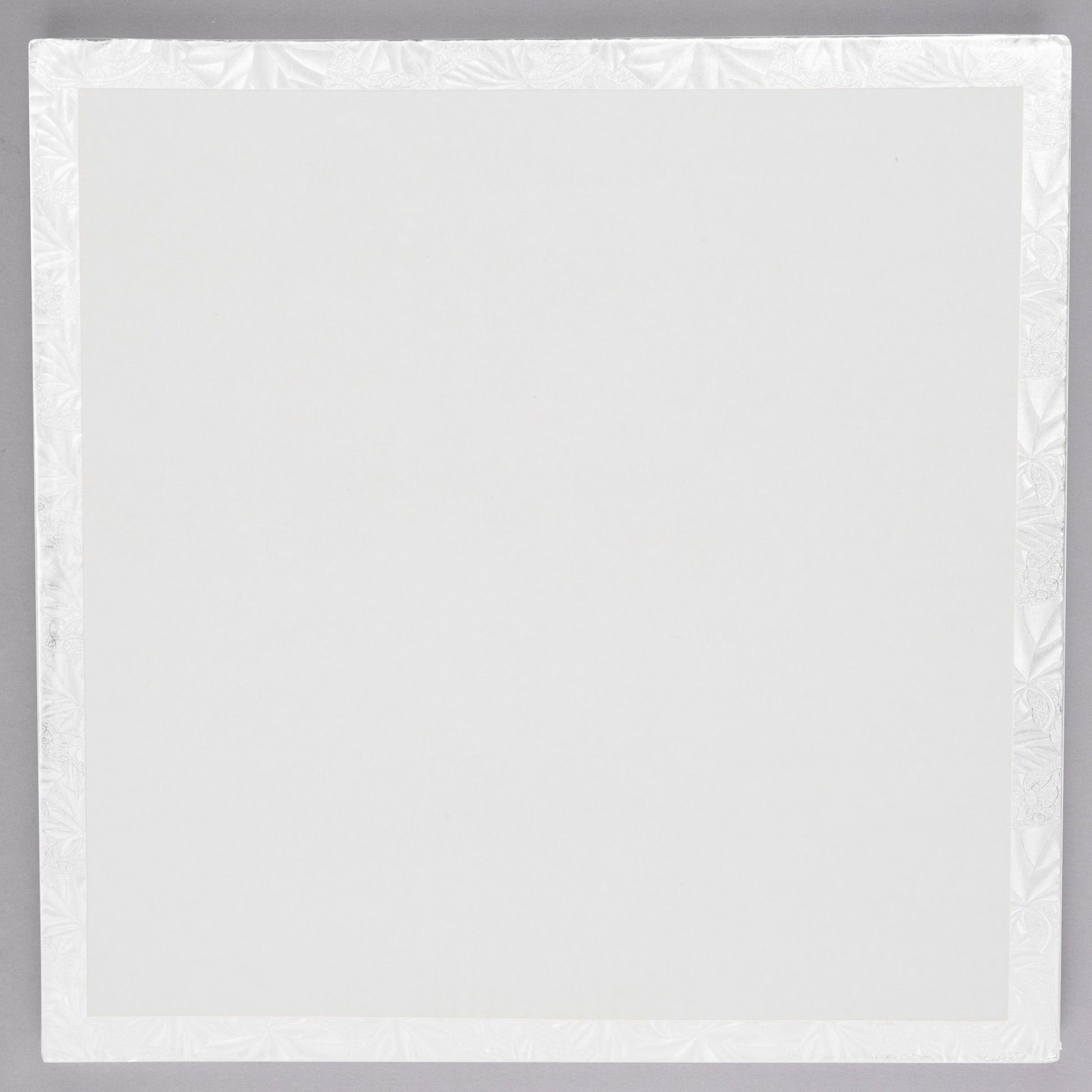 image of 14 inch square white cake drum that is 1/2 inch thick