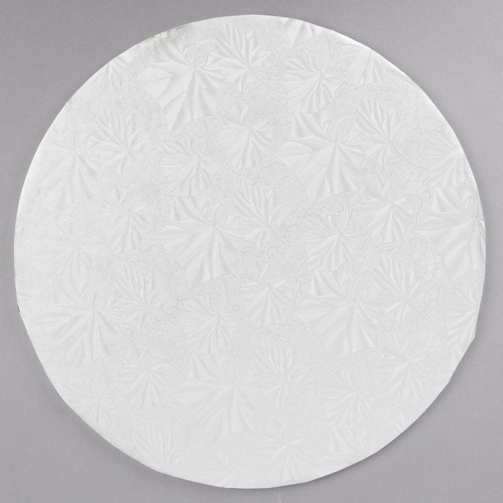 image of 10 inch round white cake drum that is 1/2 inch thick