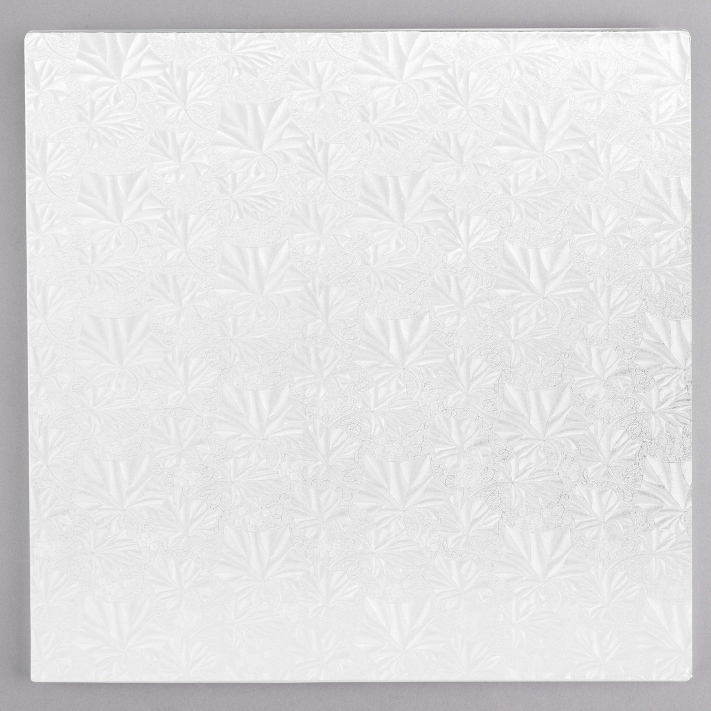 image of 14 inch square white cake drum that is 1/2 inch thick